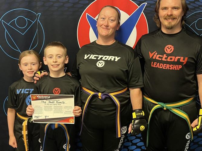 A family celebrates a new Legacy milestone
